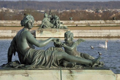 France, Yvelines, parc du Chateau de Versailles, listed as World Heritage by UNESCO, statue showing a river around the Parterre d'eau