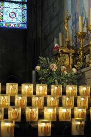 France, Paris, ile de la Cite, Notre-Dame Cathedral, candles in the effigy of Notre-Dame