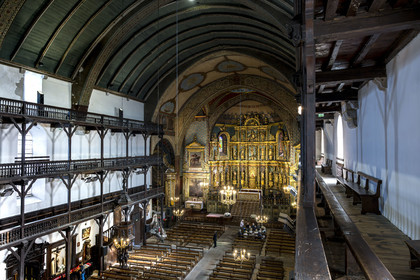 France, Pyrenees Atlantiques, Basque Country, Saint Jean de Luz, the Saint-Jean-Baptiste (Saint John the Baptist) Church, 17th century altarpiece in gilded wood and the wooden galleries of the nave