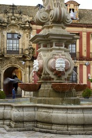 Spain, Andalusia, Seville, Santa Cruz district, fountain in front of the Archbishop's Palace portal on the plaza del Triunfo