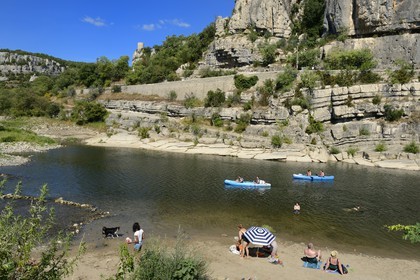 France, Ardeche, Balazuc, labelled Les Plus Beaux Villages de France (The Most Beautiful Villages of France), kayaks going down the Ardeche River