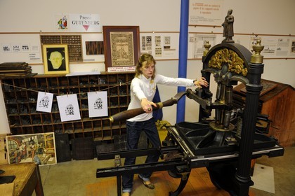 France, Vosges, Epinal, Cite de l'Image, Imagerie d'Epinal (Epinal Prints), wood engraving on a Gutenberg's press