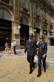 Italy, Lombardy, Milan, Vittorio Emmanuel II Gallery, shopping arcade built on the 19th century by Giuseppe Mengoni, police officers