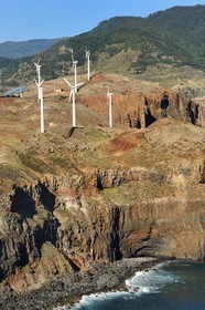 Portugal, Madeira Island, wind turbines and solar panels at the Ponta de Sao Lourenço in the far east of the island, the Ponta do Rosto cliffs