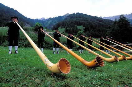 France, Hautes Alpes, Vallee Etroite (narrow valley) at the Franco Italian border, players of horns of the Alps of the formation the Briansonneurs