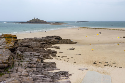France, Cotes d'Armor, Grand Site de France Cap d'Erquy - Cap Frehel, Erquy, the Saint-Michel islet topped by the Saint-Michel chapel accessible on foot at low tide via a tombolo (aerial view)