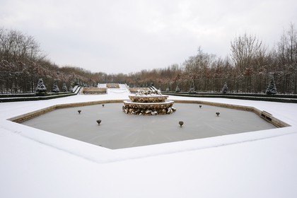France, Yvelines, snow covered park of the Chateau de Versailles, listed as World Heritage by UNESCO, the Bosquet des Trois Fontaines (the Three Fountains Grove)