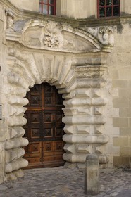 France, Gard, Uzes, 1 rue Saint Etienne, old medieval gate with diamond shaped ornaments dating from French king Louis XIII's times
