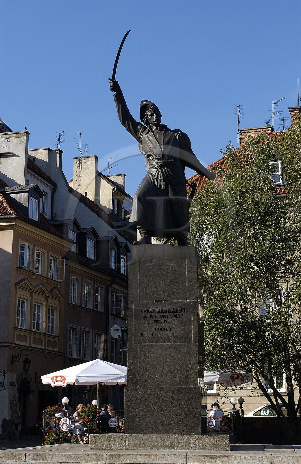 Poland, Warsaw, the old town, statue for a hero along the old wall
