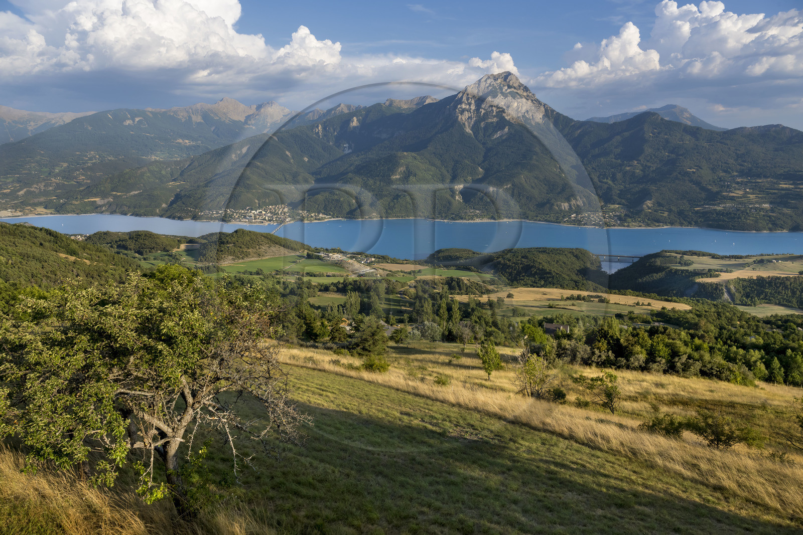 France, Hautes Alpes, Saint-Apollinaire, panorama of Lake Serre-Ponçon and the summit of Pic de Morgon (2324 m) in the background