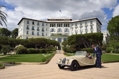 France, Alpes Maritimes, Saint Jean Cap Ferrat, Grand-Hotel du Cap Ferrat, a 5 star palace from Four Seasons Hotel, the doorman welcomes customers in a Morgan Roadster 4 4