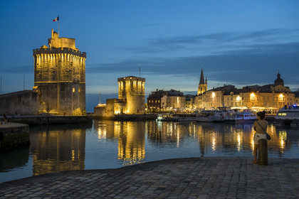 France, Charente Maritime, La Rochelle, the Old Port, Tour Saint Nicolas and Tour de la Chaine protect the entrance to the Old Port, the tour de la Lanterne in the background