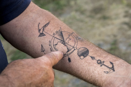 France, Finistère, Iroise Sea, Molene Island, tattoos of Guy Rocher, president of the SNSM station in Molène, his home on his island in the center of the world