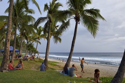 France, Reunion island (French overseas department), southern coast, Grande Anse beach, the beach is very popular weekends by Creole families for recreation and picnic, Slackline slack (the goal is to move to a slightly elastic strap without any accessories)
