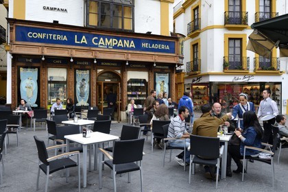 Spain, Andalusia, Seville, La Campana pastry and Cafe terrace at the corner of Calle Sierpes