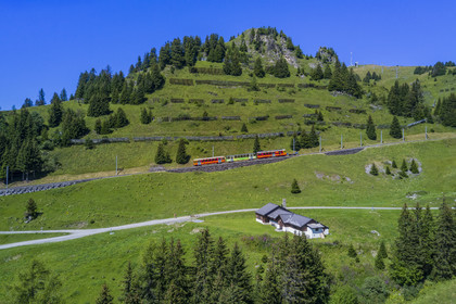 Switzerland, Canton of Vaud, Villars-sur-Ollon, train to the Bretaye pass station at the Bouquetins station and Mont-Blanc in the background (aerial view)