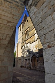France, Dordogne, Perigord Pourpre, Monpazier, labelled Les Plus Beaux Villages de France (The Most Beautiful Villages in France), western facade of St. Dominic church view from a corner of the place des Cornieres in the heart of the village