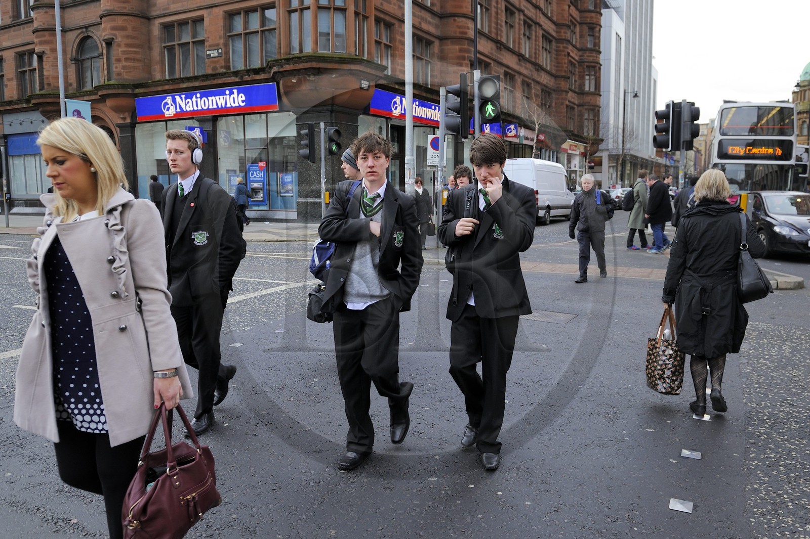 United Kingdom, Northern Ireland, Belfast, schoolchildren in uniforms after school on Donegall Square