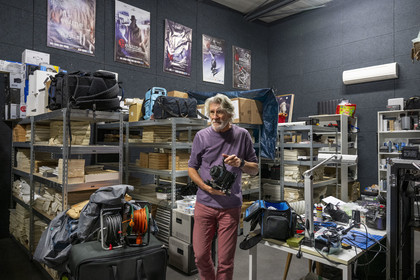 France, Cote d'Or, Beaune, Claude Lelouch Cinema Workshop, this place welcomes since 2016 twelve apprentice directors selected through competitions every year, Rémi Bergman, site director and production manager of Claude Lelouch's films, holding the camera used for the film Itinéraire d'un enfant gaté (1988)