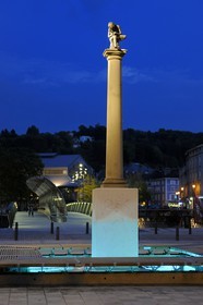 France, Vosges, Epinal, on a column over Place Pinau (Pinau's Square), a statue representing a child pulling a thorn from his feet