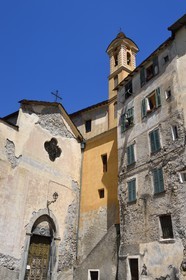 France, Alpes-Maritimes, Roya Valley (Nice hinterland), at the foot of the Mercantour National Park, Saorge, Saint-Sauveur (St. Saviour) church left and the chapel Saint Jacques of the White Penitents right