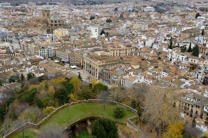 Spain, Andalusia, Granada, view of the old Moorish quarter of Albayzin classified UNESCO World Heritage right, the Plaza Nueva and the cathedral left, the Alhambra ramparts in the foreground