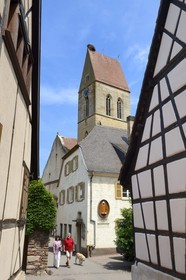 France, Haut Rhin, Eguisheim, labelled Les Plus Beaux Villages de France (The Most Beautiful Villages of France), Saint Pierre and Saint Paul Church, stork on the bell tower top