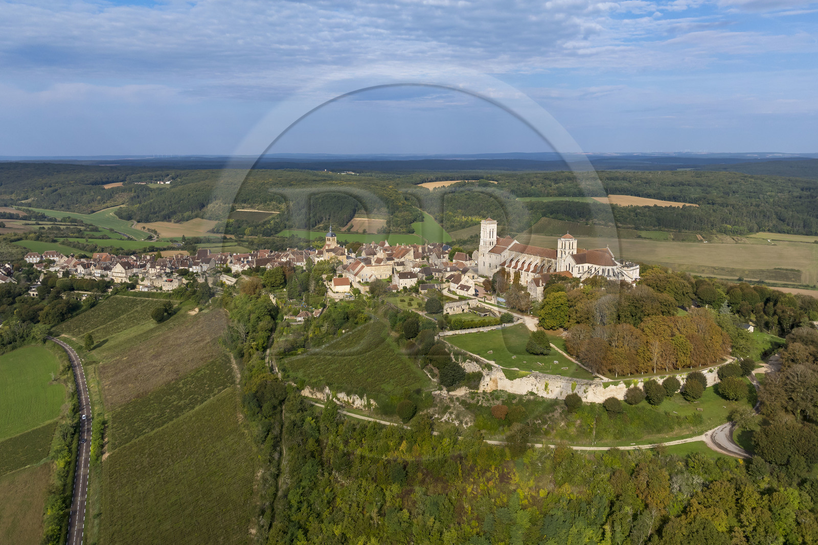 France, Yonne, regional natural park of Morvan, Vézelay, a UNESCO World Heritage site, labelled Les Plus Beaux Villages de France, starting point of one of the main ways to Santiago de Compostela, the hill and the Basilica of Saint Mary Magdalene (aerial view)