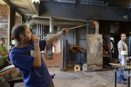 France, Moselle, Meisenthal, glassblower at the Centre international d'Art verrier (CIAV) (international glass centre) in the hot glass workshop