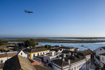 Portugal, Algarve, Faro, old town, Ryanair airliner landing over the old town and the lagoon