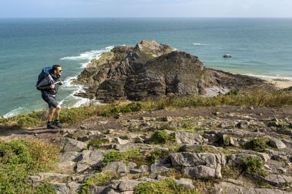 France, Cotes d'Armor, Grand Site de France Cap d'Erquy – Cap Frehel, Erquy, hikers on the GR34 hiking trail at Pointe du Cap d'Erquy