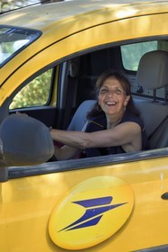 France, Var, Iles d'Hyeres, Parc National de Port Cros (National park of Port Cros), Porquerolles island, postwoman Christine Frissong tour in her electric car