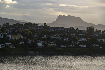 France, Pyrenees Atlantiques, Basque Country coast, Ciboure in the bay of Saint-Jean-de-Luz and the mountain Les Trois Couronnes (Penas de Haya) in the background