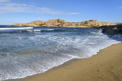 France, Haute Corse, Balagne, L'Ile Rousse, the Pietra Lighthouse and the fifteenth century Genoese tower behind the beach