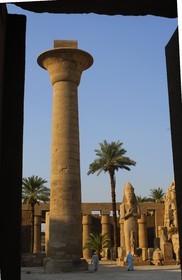 Egypt, Upper Egypt, Nile Valley, Luxor, Karnak Temple listed as World Heritage by UNESCO, column of Taharqa and the colossus of Ramesses II