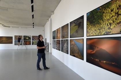 France, Var, the Rade (Roadstead) of Toulon, La Seyne-sur-Mer, district of Tamaris, the villa Tamaris, art center dedicated to the exhibition of contemporary art, the artistic director Cyril Bruneau installs Yann Arthus-Bertrand photography exhibition called Legacy