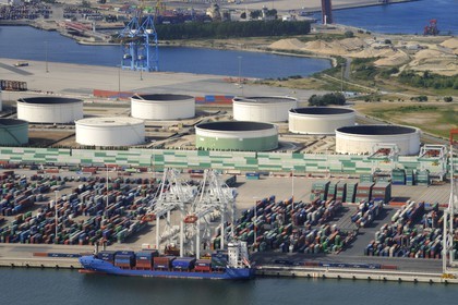 France, Seine Maritime, Le Havre, commercial port, container ship in the Rene Coty docking basin and cranes (aerial view)