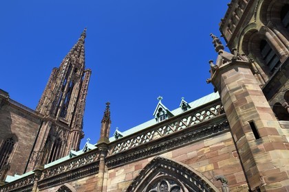 France, Bas Rhin, Strasbourg, old town listed as World Heritage by UNESCO, Notre Dame Cathedral, the spire and dog perched on a pinnacle of the south facade