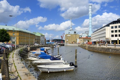 Sweden, Västra Götaland, Göteborg (Gothenburg), the channel along Brogatan and the thermal power plant of the city in the background