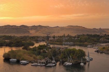 Egypt, Upper Egypt, Nubia, Nile Valley, Aswan, islets of the first cataract and the Agha Khan mausoleum in the background on the western bank