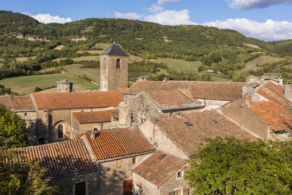 France, Aveyron, Causses and the Cévennes, cultural landscape of Mediterranean agro-pastoralism, listed as World Heritage by UNESCO, Sainte-Eulalie-de-Cernon, Templar Commandery then Hospitaller Commandery of the Order of Saint John of Jerusalem in the foreground (aerial view)