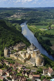 France, Dordogne, Perigord Noir, Dordogne Valley, Castelnaud la Chapelle, labelled Les Plus Beaux Villages de France (The Most Beautiful Villages of France), Castelnaud Castle on a cliff above the Dordogne valley (aerial view)
