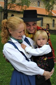 Norway, Oslo, family with Bunad traditional outfit going to the mass at Gamle Aker kirke