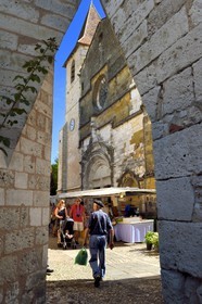 France, Dordogne, Perigord Pourpre, Monpazier, labelled Les Plus Beaux Villages de France (The Most Beautiful Villages in France), western facade of St. Dominic church view from a corner of the place des Cornieres in the heart of the village