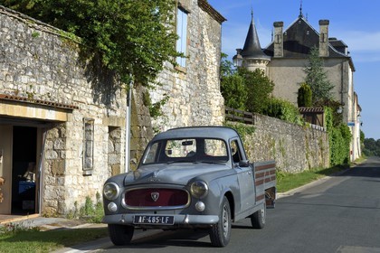 France, Dordogne, Perigord Pourpre, Monpazier, labelled Les Plus Beaux Villages de France (The Most Beautiful Villages in France), Peugeot 403 pick-up