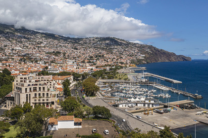 Portugal, Madeira Island, Funchal, view of the city from Santa Catarina Park, the port on the right (aerial view)