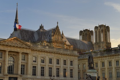 France, Marne, Reims, Notre-Dame de Reims cathedral, listed as World Heritage by UNESCO, and statue of Louis XV on the Place Royale in foreground