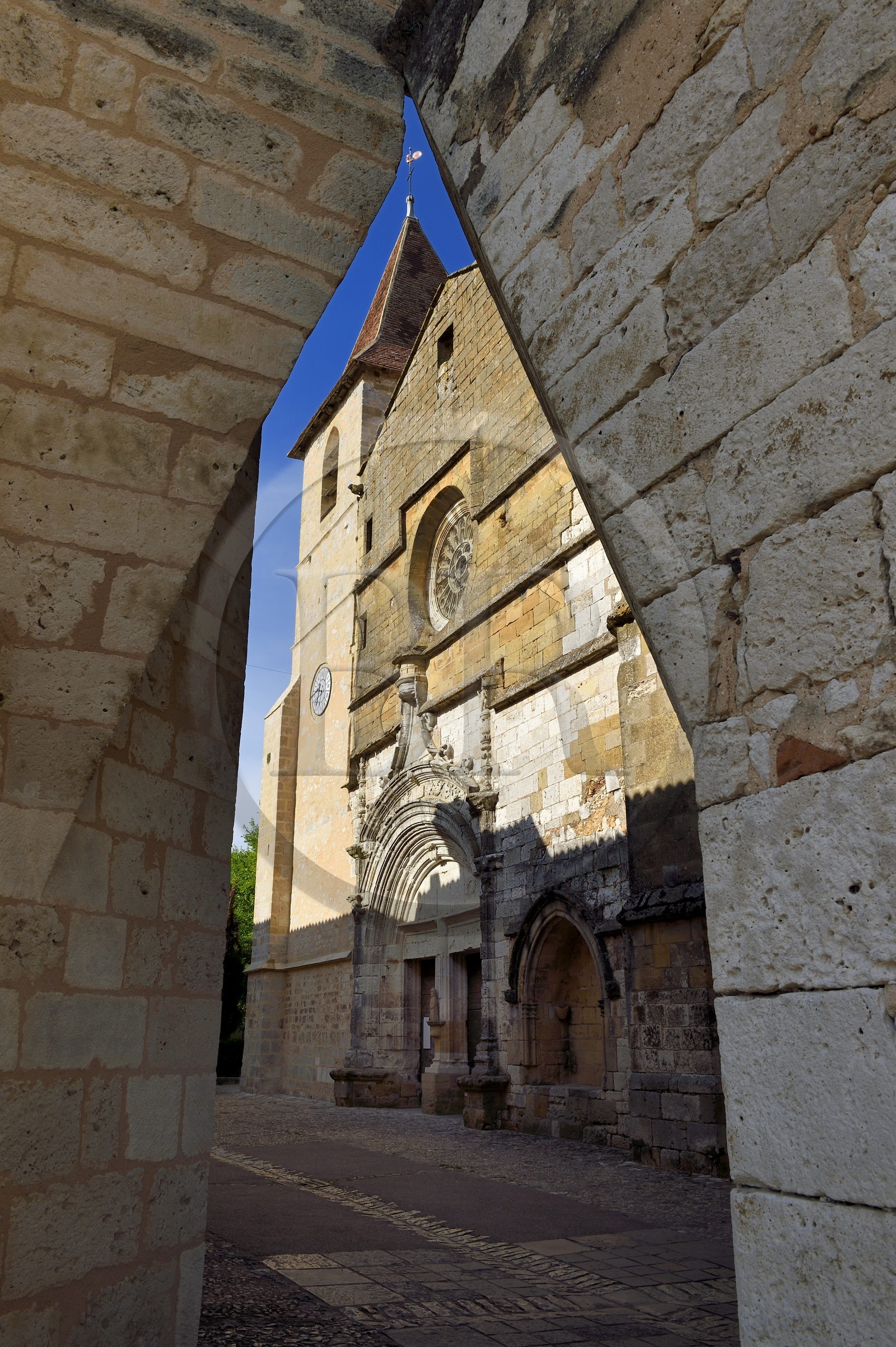 France, Dordogne, Perigord Pourpre, Monpazier, labelled Les Plus Beaux Villages de France (The Most Beautiful Villages in France), western facade of St. Dominic church view from a corner of the place des Cornieres in the heart of the village