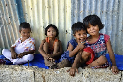 Philippines, Calamian Islands in northern Palawan, Uson Island in Coron Bay, village of Barangay Lajala children