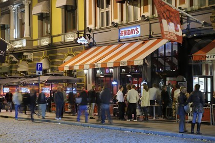 Norway, Oslo, bars and restaurants in Karl Johans Gate, one of the major shopping street of the town